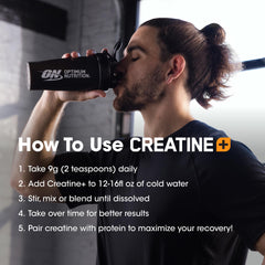 Optimum Nutrition Creatine Monohydrate Plus powder-dispense spoon in hand.
