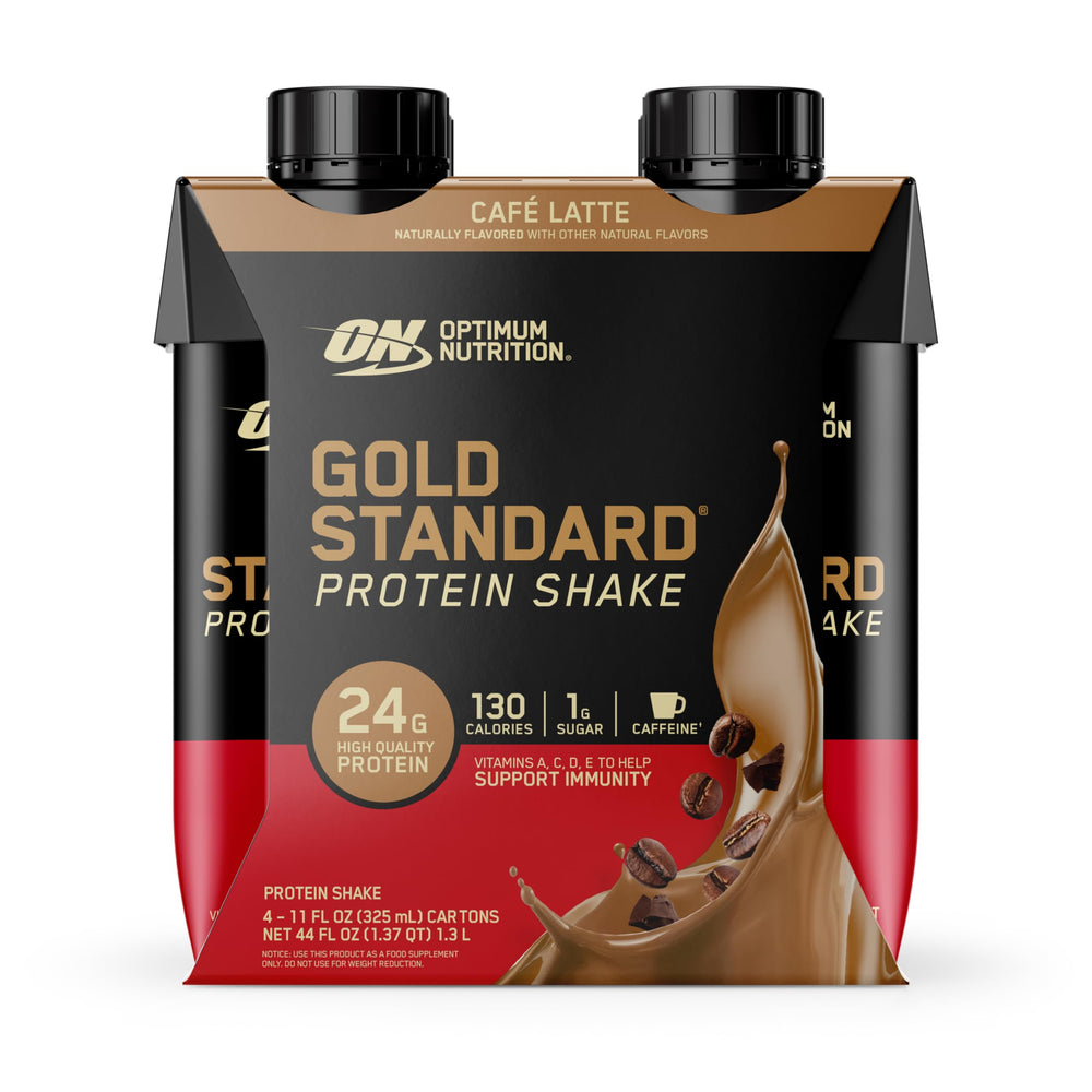 Cafe Latte shake poured into a glass suggests on-the-go protein with smooth texture.