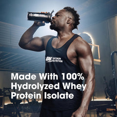 Optimum Nutrition Platinum Hydrowhey Turbo Chocolate mixing glass ready for post-workout shake.