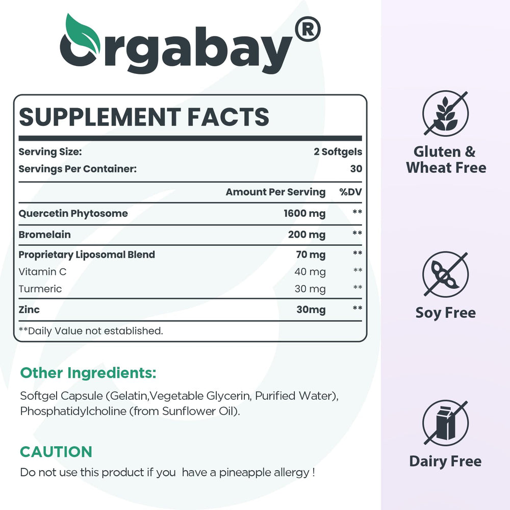 Orgabay softgels poured on a clean white surface.