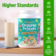 Glass of almond milk with Orgain Fruity Cereal powder mix
