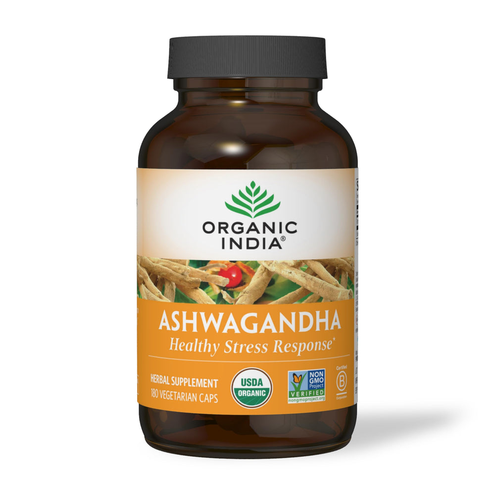 Packaging scene showing Organic India Ashwagandha capsules and label.