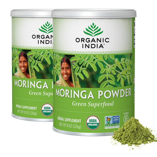 Organic India Moringa powder bottle pouring for a daily greens boost