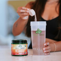 Shaker bottle with Organic Muscle powder demonstrating convenient mixing
