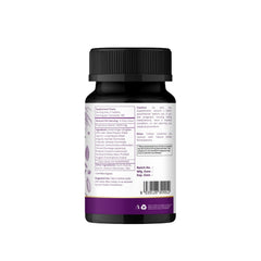 In-hand view of Organic Spree Medohar Guggulu bottle for on-the-go use