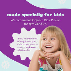 Organifi Kids Protect mixing in water glass reveals berry-flavored drink.