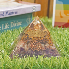 Sunstone detail on Orgonite Crystal Orgone Iron Will Pyramid highlighting radiant glow