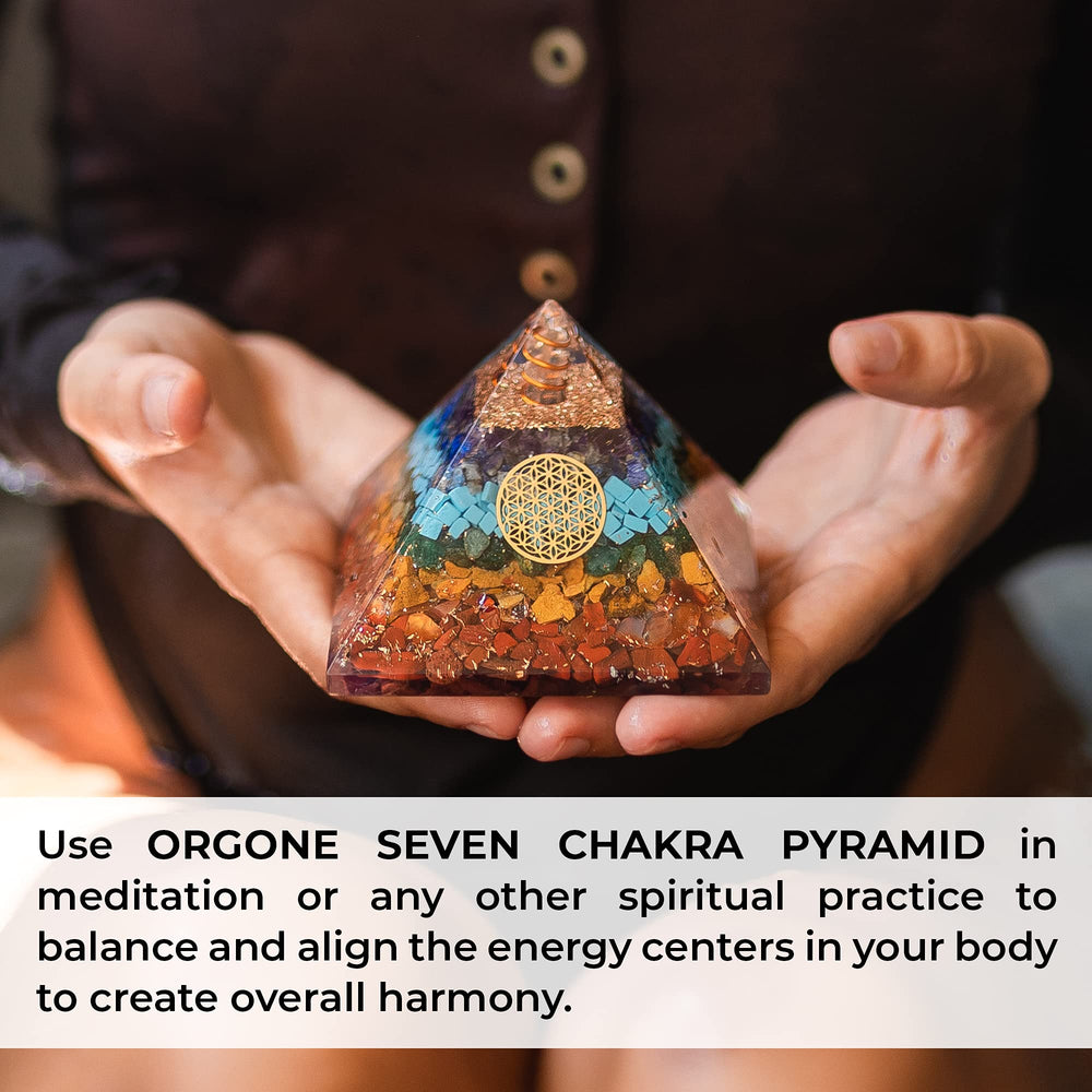 Orgonite Crystal Seven Chakra Pyramid energy-glow suggesting positive vibes.