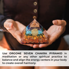 Orgonite Crystal Seven Chakra Pyramid energy-glow suggesting positive vibes.