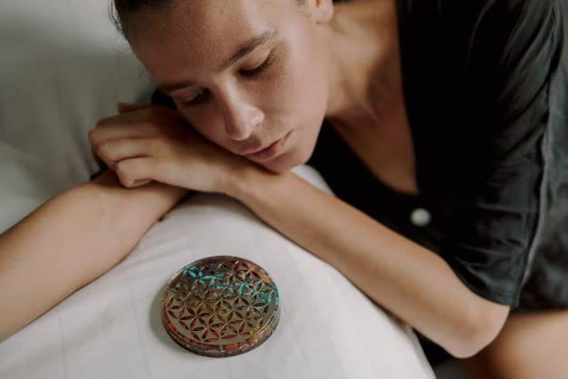 Orgonite Crystal Water Charging Plate balances root to crown chakras visually