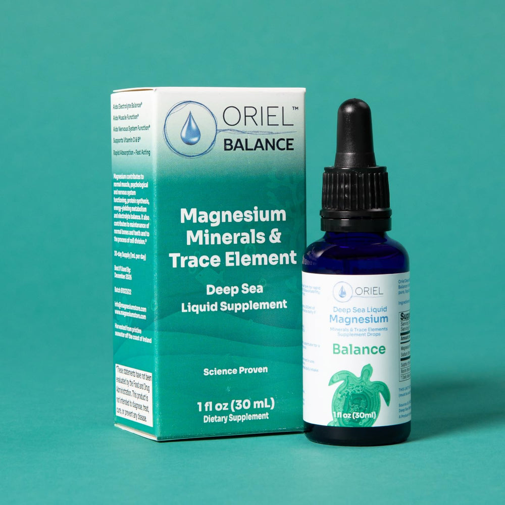 Close-up of the dropper releasing a droplet from Oriel Liquid Magnesium Drops.