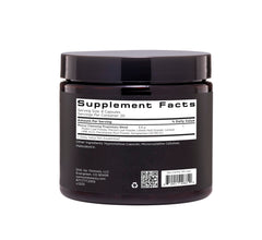 OSMOSIS Skin Clarifier capsules poured into a spoon for dosage reference.