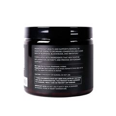 OSMOSIS Skin Clarifier packaging sits with other skincare on a vanity.