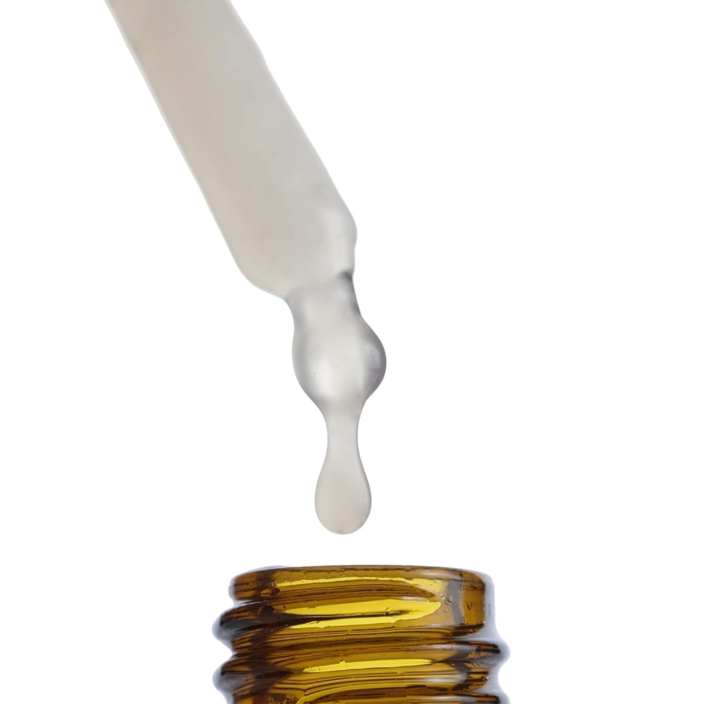 Close-up of Pai Skincare booster dropper releasing oil-soluble vitamin C for stability