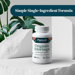 Pattern Wellness energy metabolism concept with moringa capsules for daily lift.