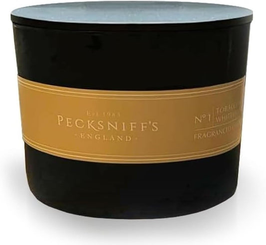 Pecksniff's black 3-wick candle close-up shows luxury fragrance and even burn.