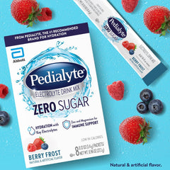 Pouring Pedialyte Berry Frost into a glass for refreshing hydration.
