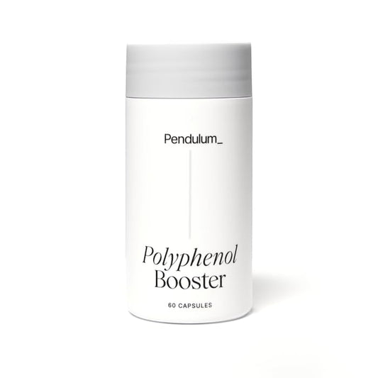 Pendulum Polyphenol Booster bottle shown on a clean kitchen counter for daily gut support.