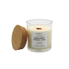 PeripetiHome Bergamot Cedar Oak candle with wooden wick for energizing ambience.