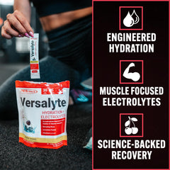 PEScience Versalyte Wild Berry packet dissolving in water for quick hydration.