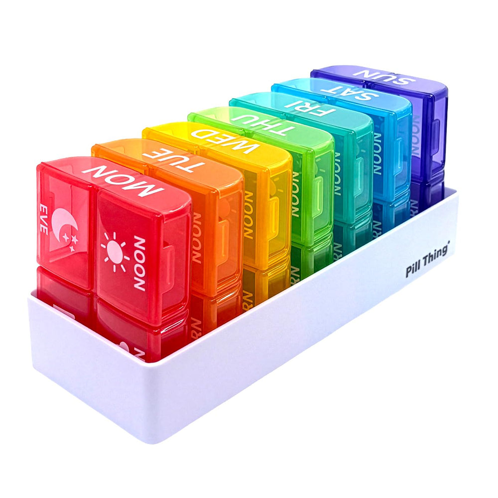 PILL THING color-coded weekly boxes for vitamins and medications.