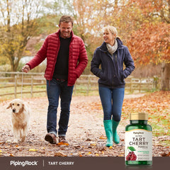 Piping Rock Tart Cherry Extract bottle on wood surface highlighting natural appeal.