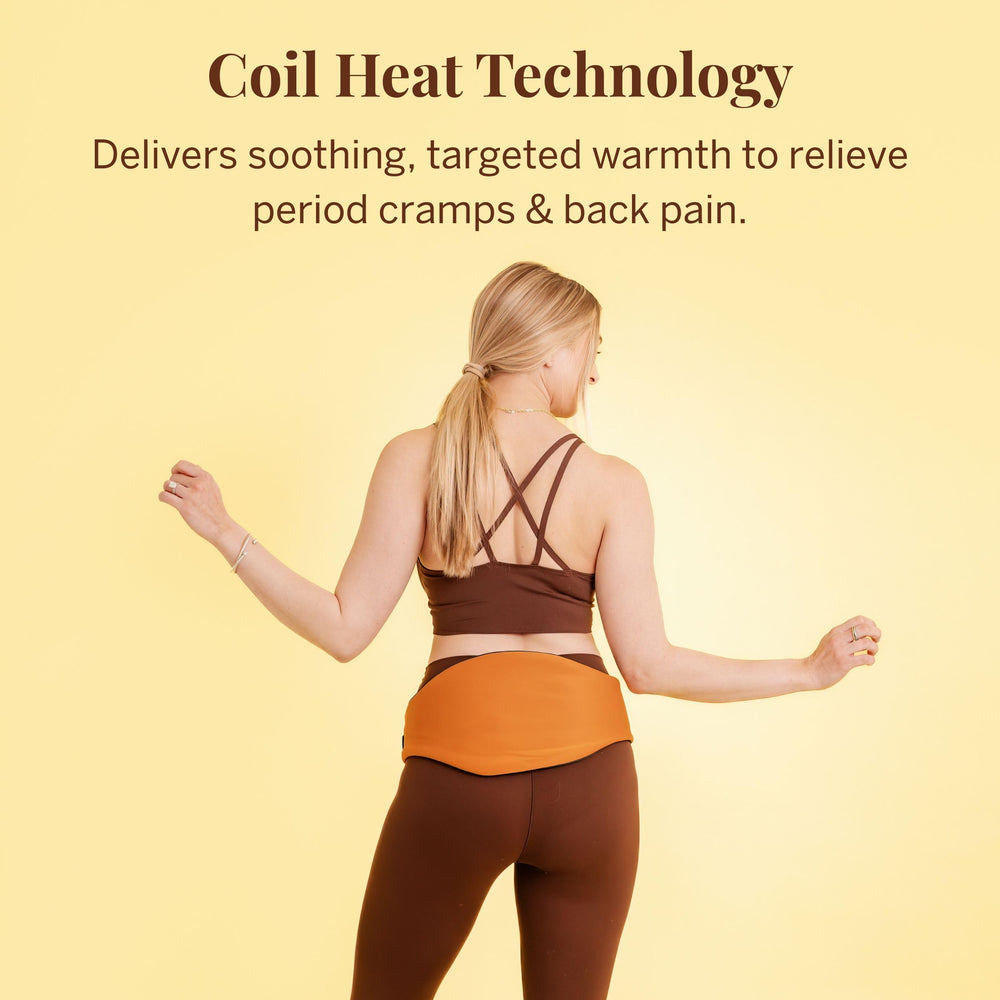Pixie Cup heating pad applied to the back for lower back warmth.
