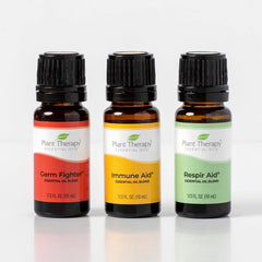 Three bottles displayed with diffuser, shows simple aroma routine for daily wellness.