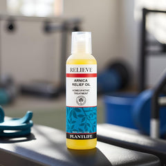 Plantlife Arnica Relieve Oil bottle highlights natural Arnica and pure essential oils.