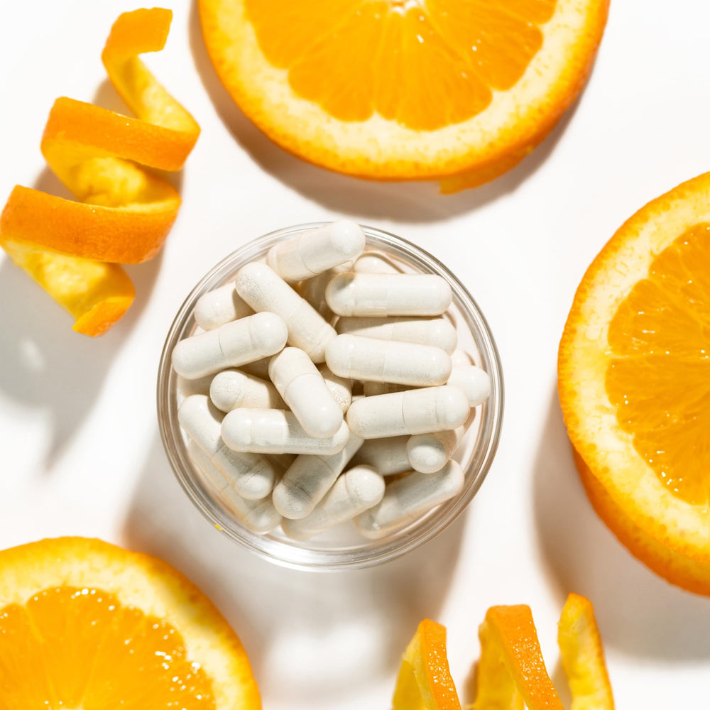 Plexus Bio Cleanse capsules dissolving in water illustrate easy dosing.