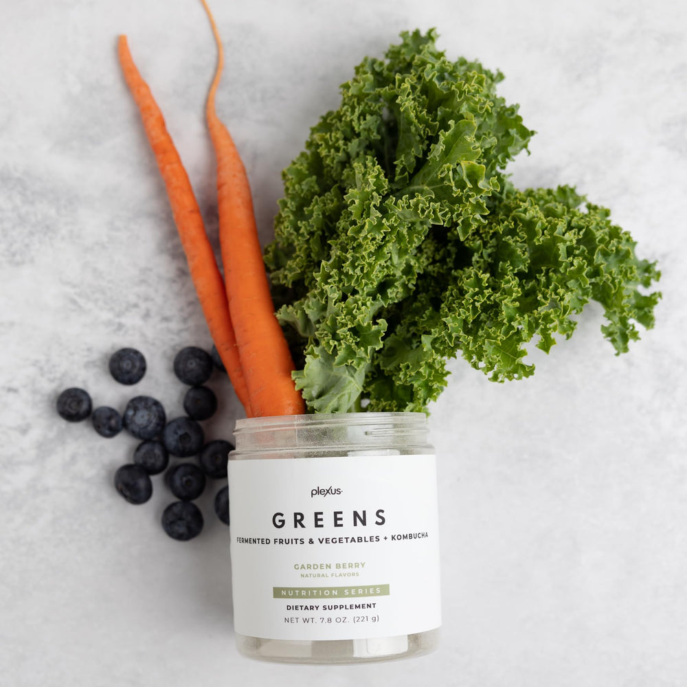 Plexus Greens green smoothie glass highlighting a vibrant, tasty greens option.