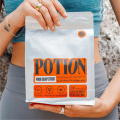 Potion Supernatural Hydration glass with ice for the chilled post-workout hydration.