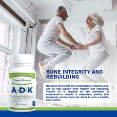 Power By Naturals ADK supplement on table ready for daily routine