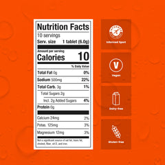 Precision Hydration orange tablets in a glass with a refreshing fizz.