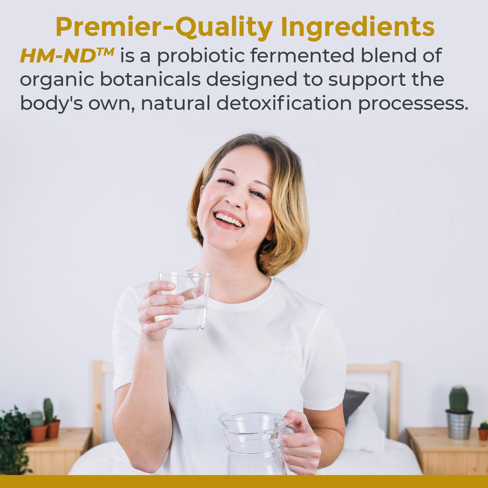 Fermented HM-ND drops in a glass illustrate convenient detox ritual.