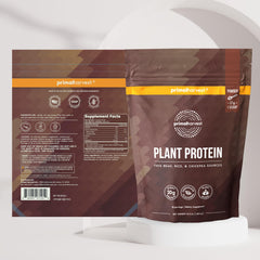 Primal Harvest vegan chocolate protein powder in glass with milk, for smooth shakes.