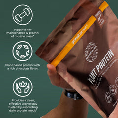 Primal Harvest vegan chocolate protein powder measuring scoop near oatmeal, ideal breakfast boost.