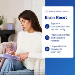 Dispensed Brain Reset capsules on a desk suggest easy daily use.