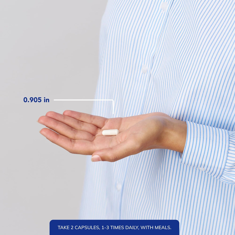 Pure Encapsulations Calcium K/D capsules in hand for daily bone support.