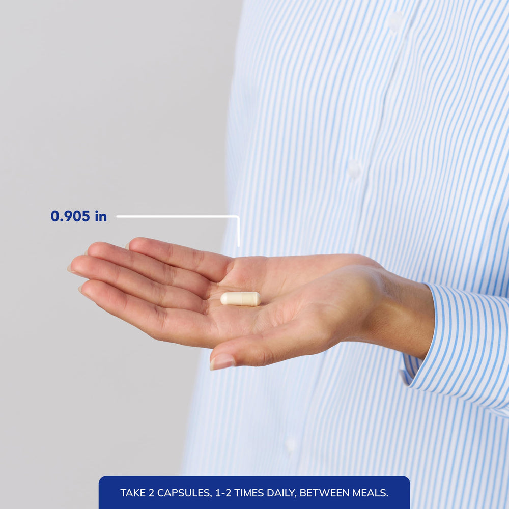 Hand pouring capsules to emphasize simple on-the-go use