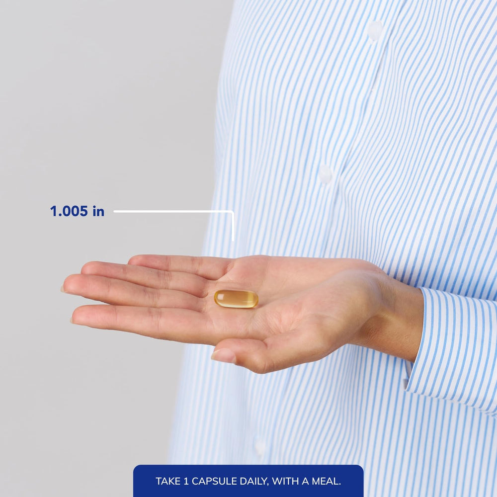 Pure Encapsulations O.N.E. Omega softgel in hand; easy swallow in daily routines.
