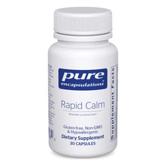 Pure Encapsulations Rapid Calm bottle on desk, suggesting on-the-go stress support.