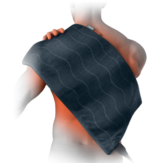Pure Enrichment PureRelief Pro 12x24 pad on bed offering broad back coverage for comfort.