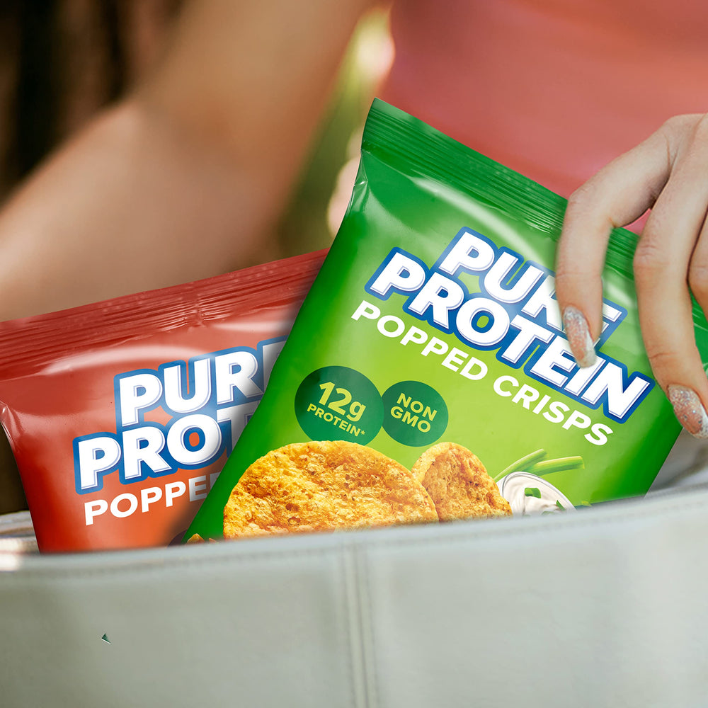 Pure Protein Popped Crisps variety display featuring two flavorful, protein-packed options.