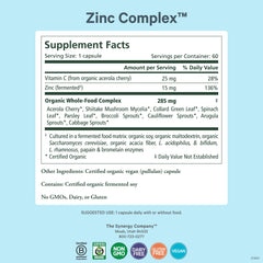 Closeup of PURE SYNERGY Zinc Complex capsules illustrating gentle digestion and plant cofactors.