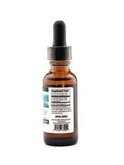 Purely Wild oregano oil bottle with fresh herbs for versatile daily use.