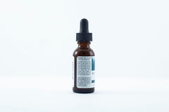 PURELY WILD SpruceAlive topical oil on skin for soothing routines.