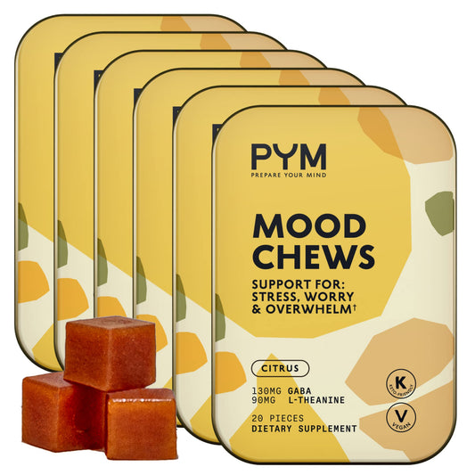 PYM Citrus Mood Chews bottle on a counter for on-the-go mood support.