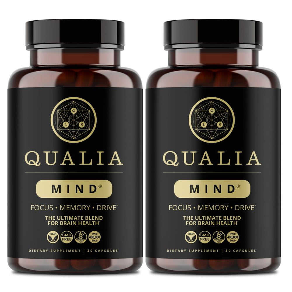 Qualia Mind bottle closeup with capsules that may support focused work.