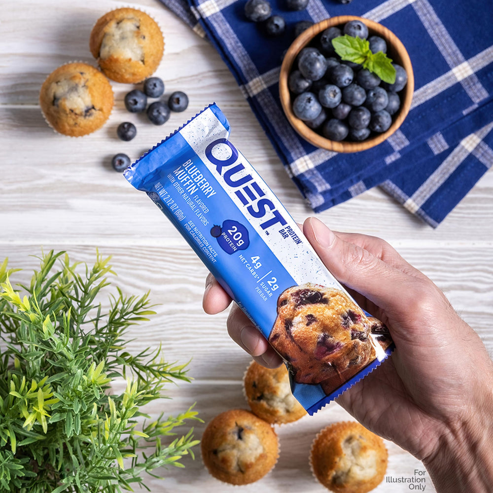 Quest protein bar on a desk for quick desk-side nutrition.